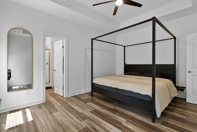 136 Hatchet Cv, Louisburg, NC 27549 - bedroom featuring wood finished floors, baseboards, and ceiling fan