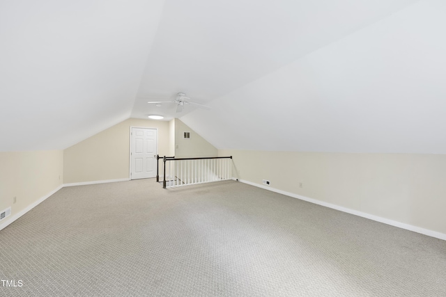 1007 Surry Dale Ct, Apex, NC 27502 - additional living space featuring a ceiling fan, lofted ceiling, light colored carpet, and baseboards