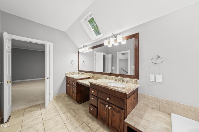 1007 Surry Dale Ct, Apex, NC 27502 - full bathroom featuring a skylight, double vanity, lofted ceiling, tile patterned flooring, and a bathtub