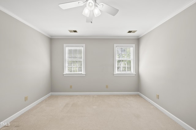 1007 Surry Dale Ct, Apex, NC 27502 - spare room featuring crown molding, light carpet, baseboards, and ceiling fan