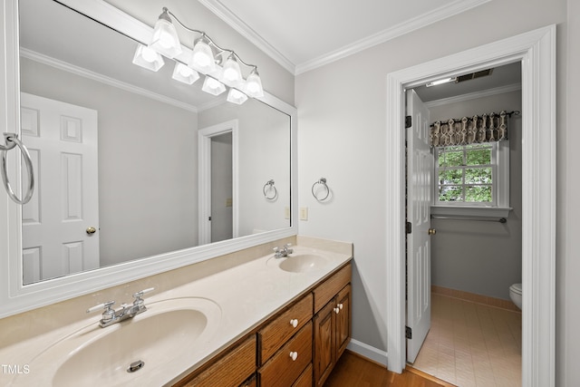 1007 Surry Dale Ct, Apex, NC 27502 - full bathroom with baseboards, double vanity, toilet, and ornamental molding