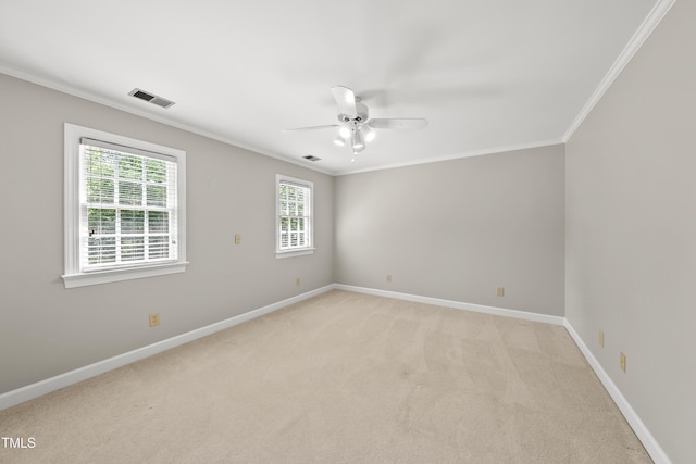 1007 Surry Dale Ct, Apex, NC 27502 - spare room featuring ornamental molding, baseboards, ceiling fan, and light colored carpet