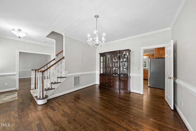 1007 Surry Dale Ct, Apex, NC 27502 - unfurnished dining area featuring dark wood-style flooring, a chandelier, stairway, ornamental molding, and baseboards