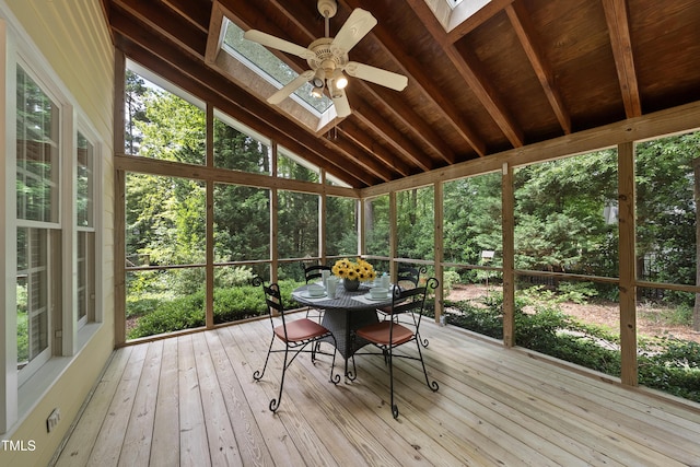 1007 Surry Dale Ct, Apex, NC 27502 - sunroom / solarium featuring a skylight, ceiling fan, outdoor dining space, and vaulted ceiling