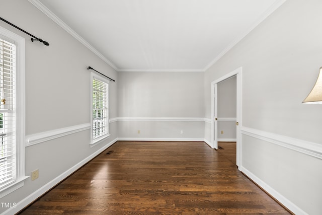 1007 Surry Dale Ct, Apex, NC 27502 - spare room featuring ornamental molding, wood finished floors, and baseboards