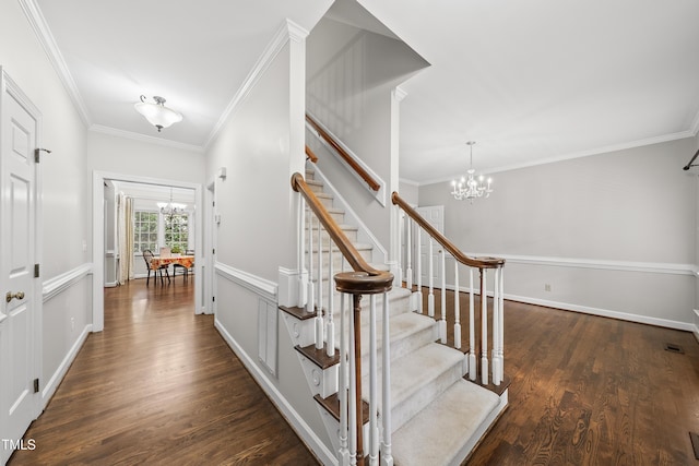 1007 Surry Dale Ct, Apex, NC 27502 - stairs with a chandelier, wood finished floors, crown molding, and baseboards