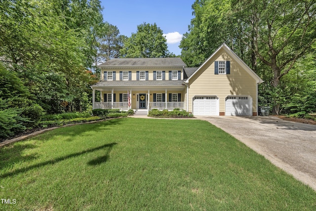 1007 Surry Dale Ct, Apex, NC 27502 - colonial inspired home with covered porch, concrete driveway, a front lawn, and a garage