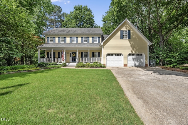 1007 Surry Dale Ct, Apex, NC 27502 - colonial inspired home featuring a porch, driveway, a front lawn, and a garage