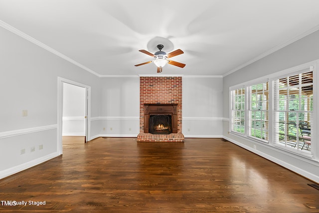 1007 Surry Dale Ct, Apex, NC 27502 - unfurnished living room featuring ceiling fan, ornamental molding, wood finished floors, a brick fireplace, and baseboards