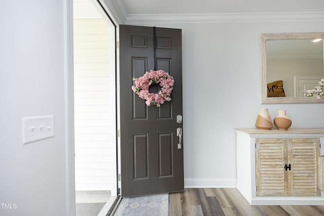2264 Jollay St, Durham, NC 27703 - foyer entrance with wood finished floors, ornamental molding, and baseboards