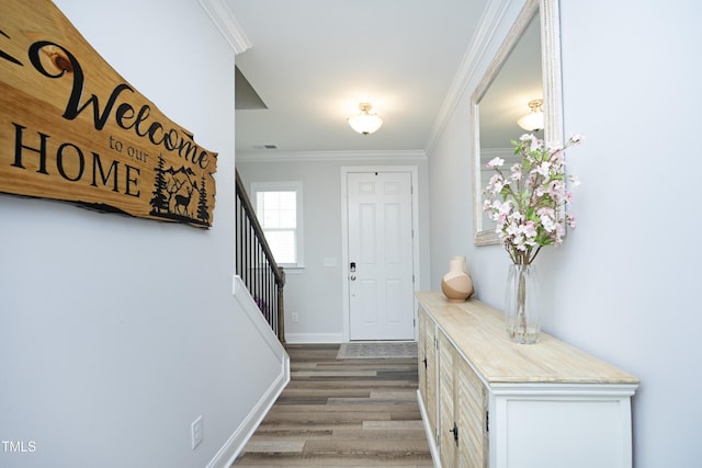 2264 Jollay St, Durham, NC 27703 - entrance foyer featuring wood finished floors, ornamental molding, stairs, and baseboards
