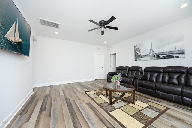 2264 Jollay St, Durham, NC 27703 - living room featuring wood finished floors, a ceiling fan, recessed lighting, and baseboards