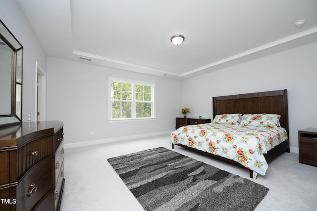2264 Jollay St, Durham, NC 27703 - bedroom featuring carpet flooring, a tray ceiling, and baseboards