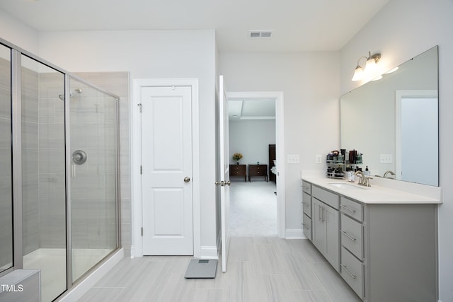 2264 Jollay St, Durham, NC 27703 - ensuite bathroom featuring vanity, a stall shower, and baseboards