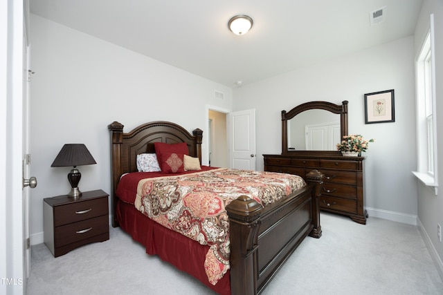 2264 Jollay St, Durham, NC 27703 - bedroom with light colored carpet and baseboards
