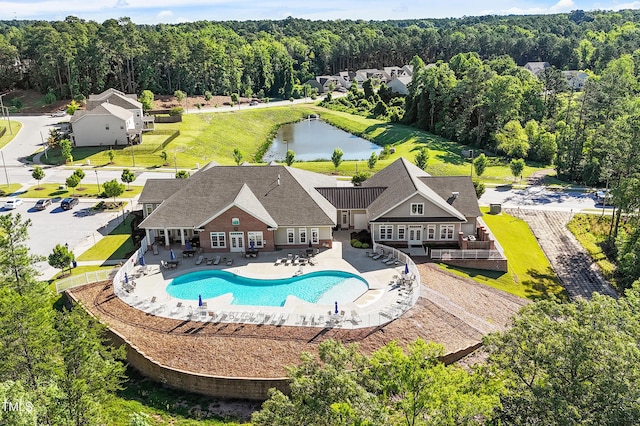 2264 Jollay St, Durham, NC 27703 - outdoor pool with a patio area, a water view, and a wooded view