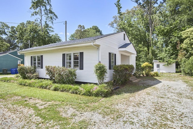 2616 Kirk Rd, Durham, NC 27705 - view of property exterior with an outbuilding