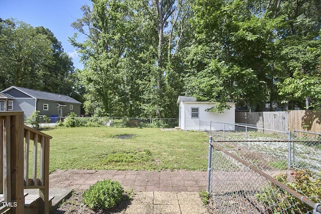 2616 Kirk Rd, Durham, NC 27705 - view of yard featuring an outdoor structure and a gate