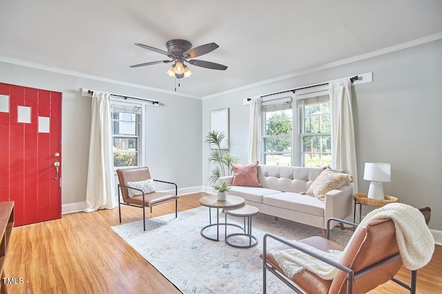 2616 Kirk Rd, Durham, NC 27705 - living area with plenty of natural light, baseboards, ornamental molding, light wood-style floors, and a ceiling fan