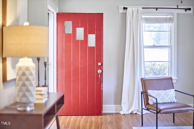 2616 Kirk Rd, Durham, NC 27705 - foyer featuring healthy amount of natural light, wood finished floors, and baseboards