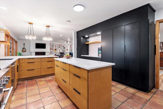 500 Walnut Creek Dr, Goldsboro, NC 27534 - kitchen with modern cabinets, pendant lighting, open floor plan, stainless steel range oven, and open shelves