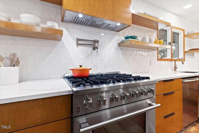 500 Walnut Creek Dr, Goldsboro, NC 27534 - kitchen featuring stainless steel appliances, open shelves, a sink, extractor fan, and tasteful backsplash