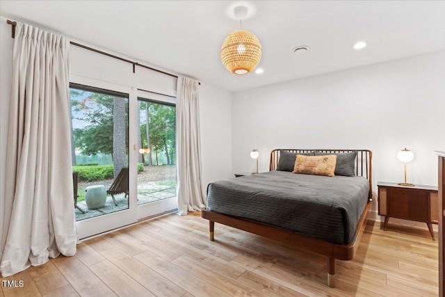 500 Walnut Creek Dr, Goldsboro, NC 27534 - bedroom featuring wood finished floors, access to outside, and recessed lighting