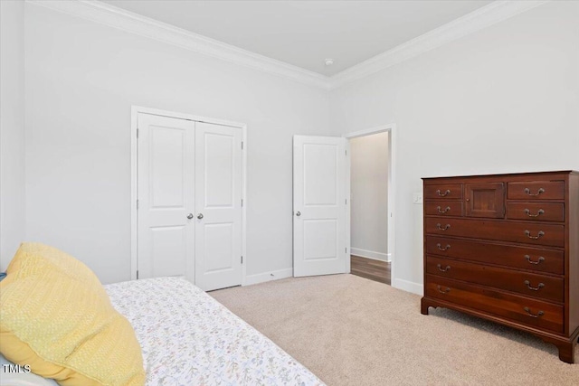 7801 Charters End St, Willow Springs, NC 27592 - bedroom featuring ornamental molding, carpet, a closet, and baseboards