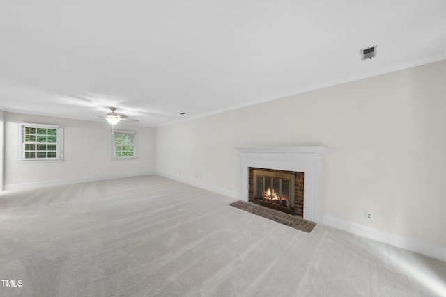 2300 Valley Forge Dr, Raleigh, NC 27615 - unfurnished living room with a fireplace, ceiling fan, light carpet, and crown molding