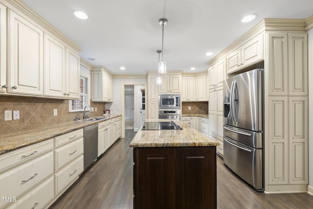 2300 Valley Forge Dr, Raleigh, NC 27615 - kitchen with stainless steel appliances, cream cabinets, dark wood finished floors, recessed lighting, and crown molding