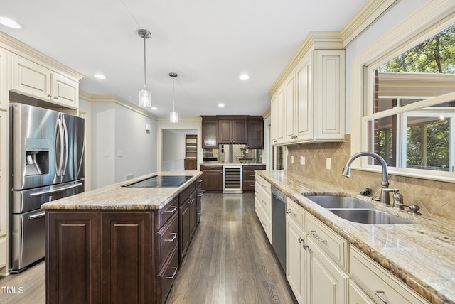 2300 Valley Forge Dr, Raleigh, NC 27615 - kitchen with appliances with stainless steel finishes, wine cooler, cream cabinetry, dark brown cabinetry, and recessed lighting