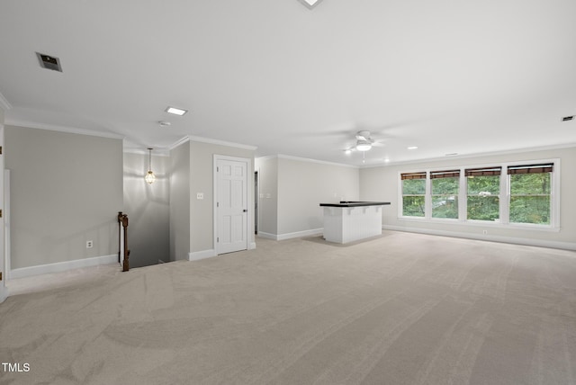 2300 Valley Forge Dr, Raleigh, NC 27615 - unfurnished living room featuring ornamental molding, a ceiling fan, and light colored carpet