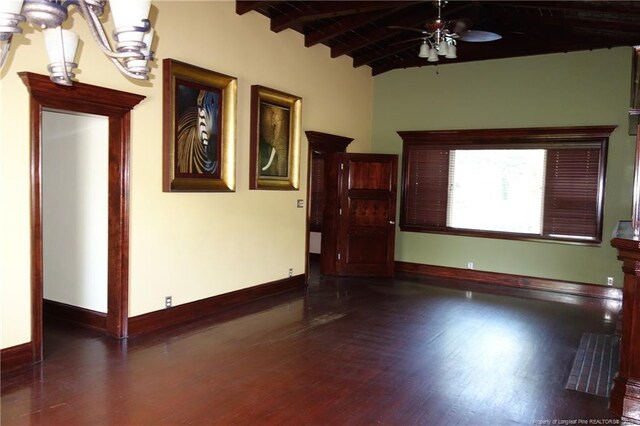 706 Riverside Dr, Lumberton, NC 28358 - unfurnished living room with baseboards, a ceiling fan, wood finished floors, and a chandelier