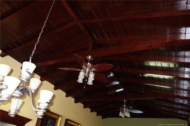 706 Riverside Dr, Lumberton, NC 28358 - detailed view of a ceiling fan and wood ceiling with exposed beams