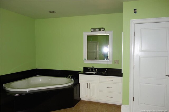 706 Riverside Dr, Lumberton, NC 28358 - full bathroom featuring vanity, a bath, and tile patterned floors