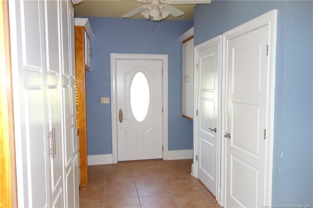 706 Riverside Dr, Lumberton, NC 28358 - foyer entrance featuring a ceiling fan, light tile patterned flooring, and baseboards