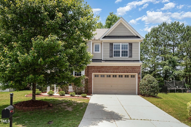 233 Hammond Wood Pl, Morrisville, NC 27560 - view of front facade featuring brick siding, concrete driveway, an attached garage, and a front lawn