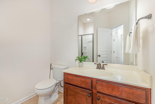 233 Hammond Wood Pl, Morrisville, NC 27560 - full bathroom with tile patterned floors, vanity, toilet, a shower, and baseboards