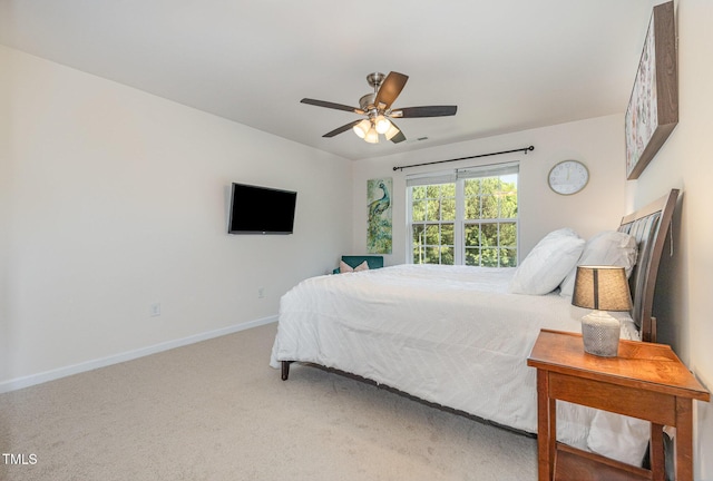 233 Hammond Wood Pl, Morrisville, NC 27560 - carpeted bedroom featuring baseboards and a ceiling fan
