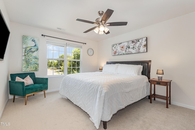 233 Hammond Wood Pl, Morrisville, NC 27560 - bedroom featuring baseboards, light carpet, and a ceiling fan