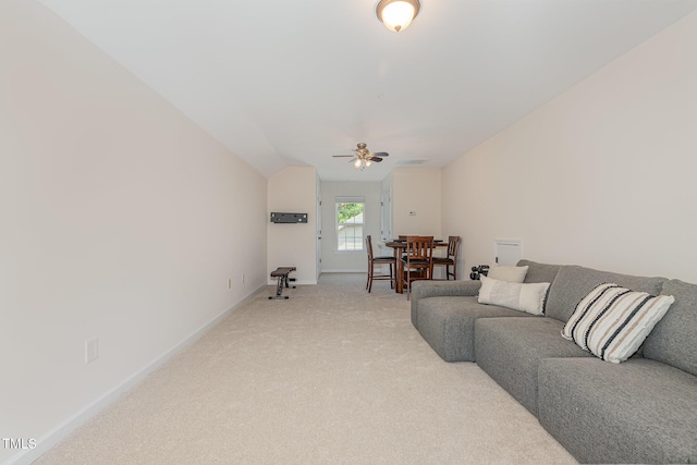 233 Hammond Wood Pl, Morrisville, NC 27560 - living room featuring ceiling fan, light carpet, lofted ceiling, and baseboards