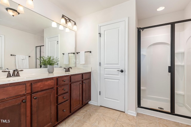 233 Hammond Wood Pl, Morrisville, NC 27560 - full bath with double vanity, a stall shower, tile patterned floors, and baseboards