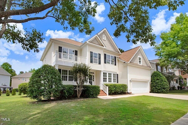 1420 Lagerfeld Way, Wake Forest, NC 27587 - view of front facade with a balcony, concrete driveway, a front yard, and a garage
