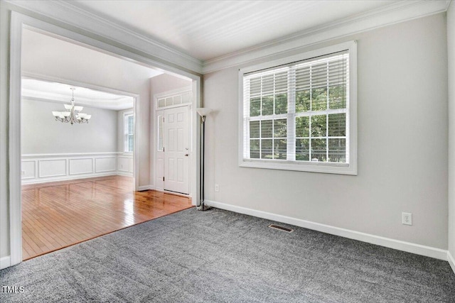 1420 Lagerfeld Way, Wake Forest, NC 27587 - carpeted empty room featuring a chandelier, crown molding, and baseboards