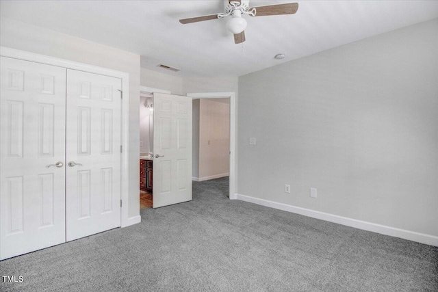 1420 Lagerfeld Way, Wake Forest, NC 27587 - unfurnished bedroom with carpet flooring, baseboards, a closet, and a ceiling fan