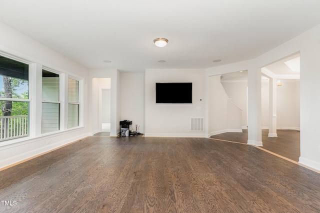66 Sweet Meadow Ln, Pittsboro, NC 27312 - unfurnished living room with wood finished floors and baseboards