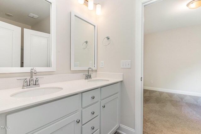 66 Sweet Meadow Ln, Pittsboro, NC 27312 - bathroom with double vanity and baseboards