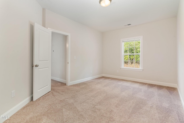 66 Sweet Meadow Ln, Pittsboro, NC 27312 - carpeted empty room with baseboards