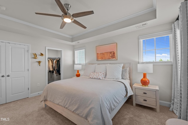 518 Toran Dr, Wake Forest, NC 27587 - bedroom featuring carpet flooring, crown molding, a raised ceiling, baseboards, and ceiling fan