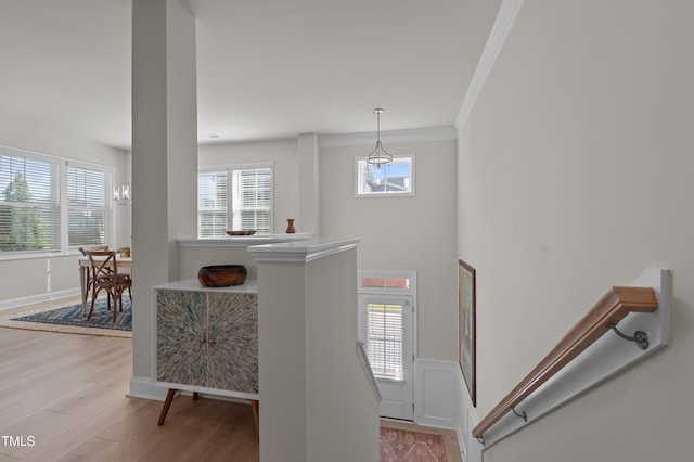 518 Toran Dr, Wake Forest, NC 27587 - foyer with crown molding, wood finished floors, a chandelier, and baseboards